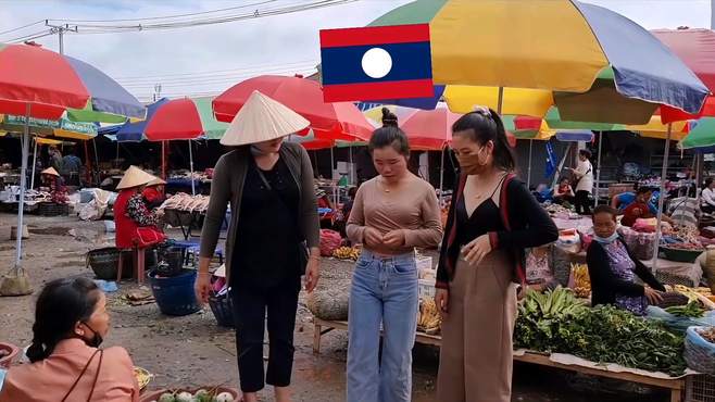 老挝农村市场，逛市场购物，人还挺多